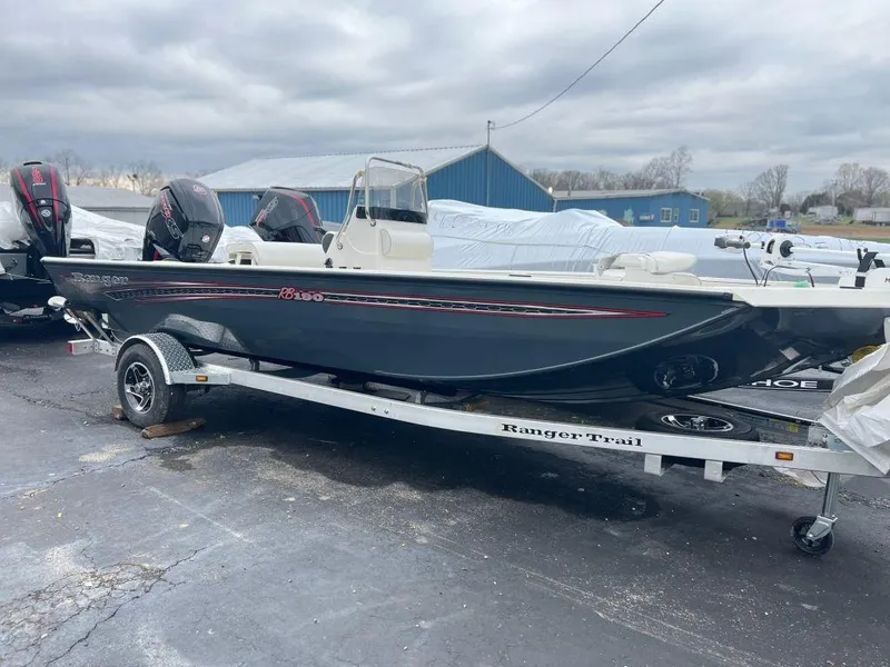 The Image of 2023 Ranger RB190 boat on a trailer, parked outdoors. - 1