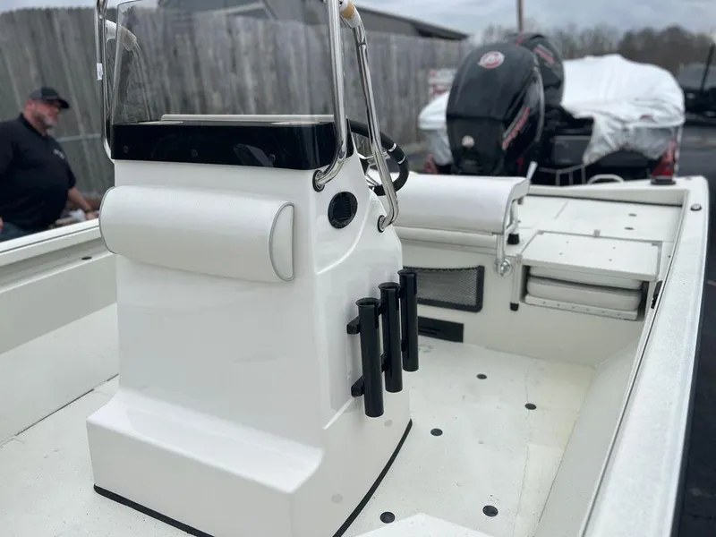 Slide: The Image of 2023 Ranger RB190 boat interior with console and motor. - 10