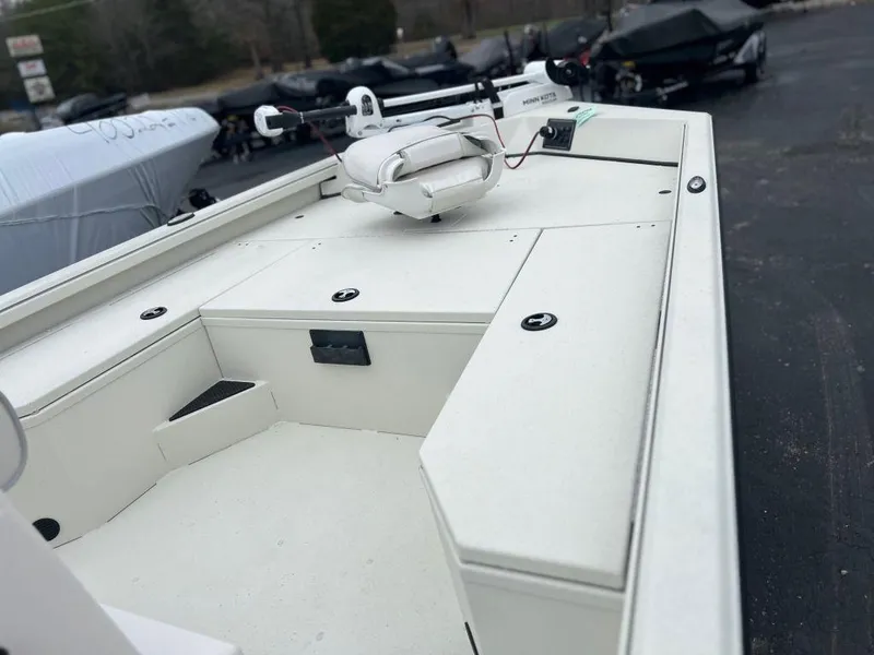 Slide: The Image of 2023 Ranger RB190 boat deck with storage compartments and mounted equipment. - 4