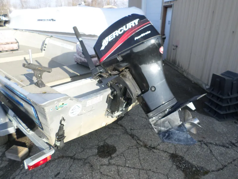 Slide: The Image of 1983 Sea Nymph 16 boat with Mercury FourStroke outboard motor on trailer. - 4