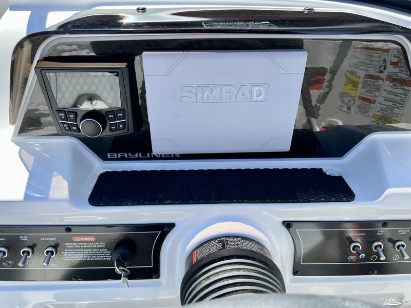 Slide: The Image of Dashboard of 2023 Bayliner DX2050 boat with Simrad navigation system. - 4