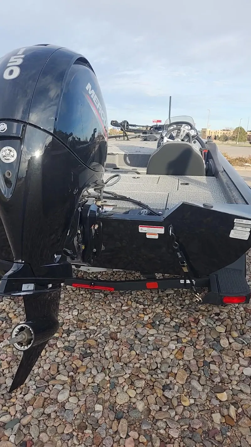 Slide: The Image of 2023 Tracker Pro Team 195 TXW Tournament Edition boat with Mercury outboard motor. - 3