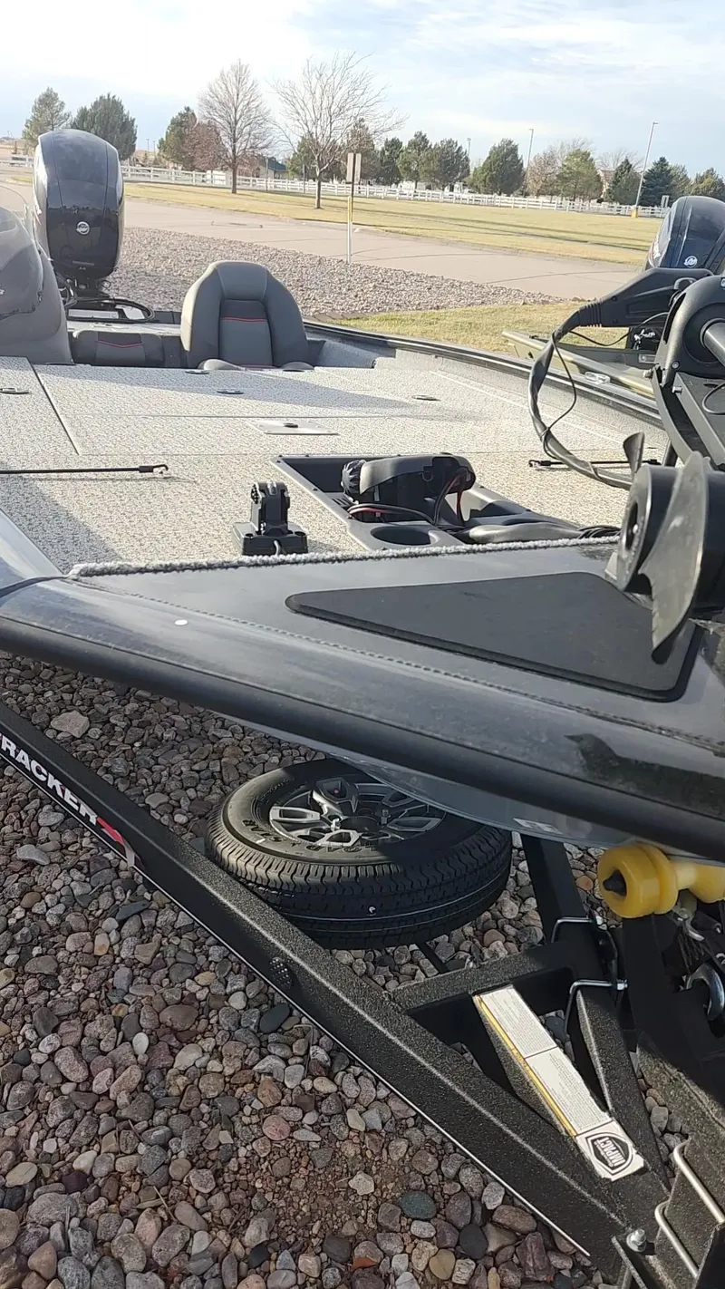 Slide: The Image of 2023 Tracker Pro Team 195 TXW Tournament Edition boat on trailer. - 5