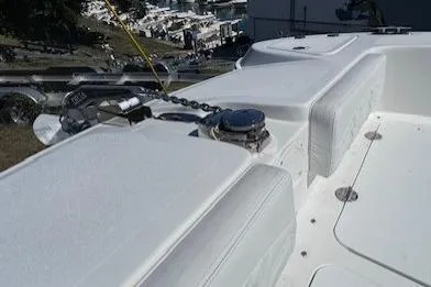 Slide: The Image of 2023 Twin Vee 280 GFX CC boat deck with anchor chain and seating. - 17