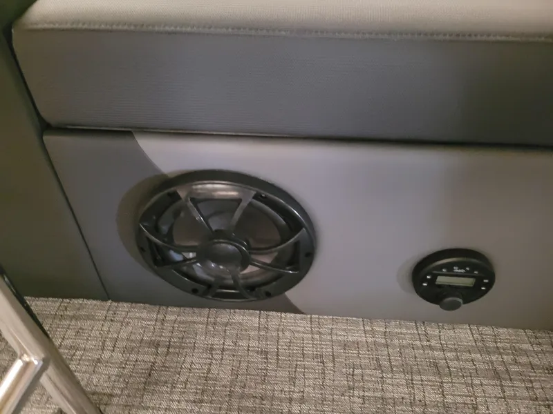 Slide: The Image of 2023 Trifecta 24' SB2 ARCH SS 3 Plus boat interior speaker and control panel. - 12