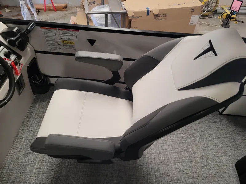 Slide: The Image of Captain's chair in 2023 Trifecta 24' SB2 ARCH SS 3 Plus boat, featuring sleek design. - 14