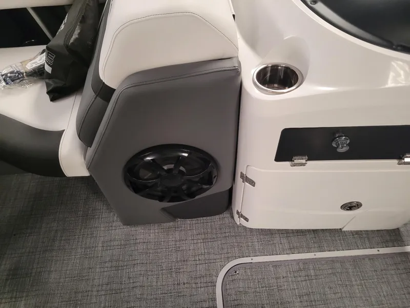 Slide: The Image of Interior of 2023 Trifecta 24' SB2 ARCH SS 3 Plus boat with speaker and cup holder. - 17