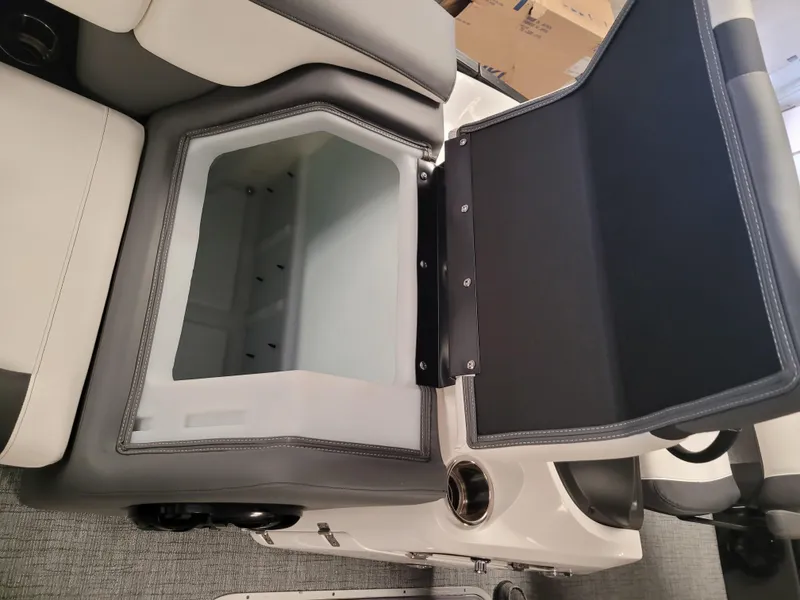 Slide: The Image of Open storage compartment in 2023 Trifecta 24' SB2 ARCH SS 3 Plus boat. - 21