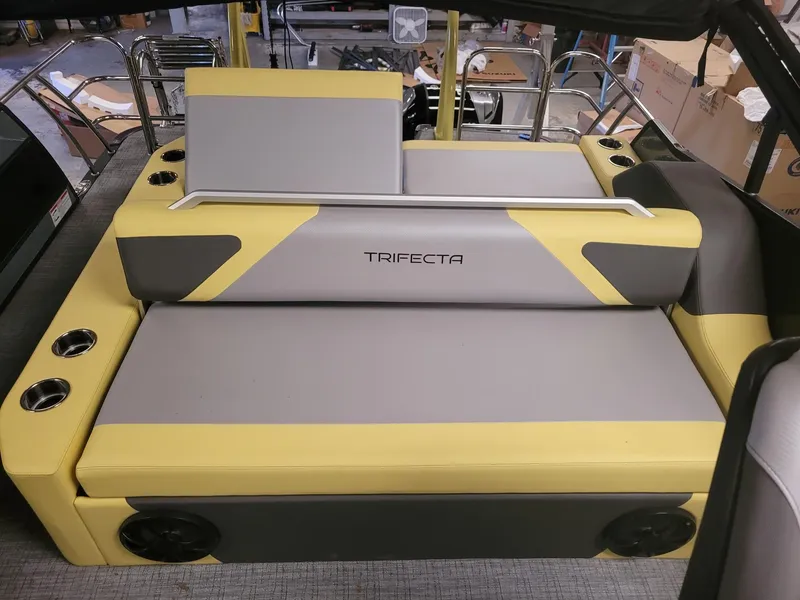 Slide: The Image of Trifecta 2023 23 UL SS boat seating with yellow and gray upholstery. - 10
