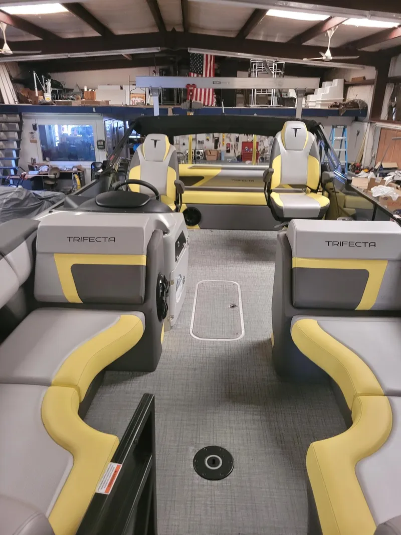 Slide: The Image of Interior of 2023 Trifecta 23 UL SS boat with modern seating and design. - 7