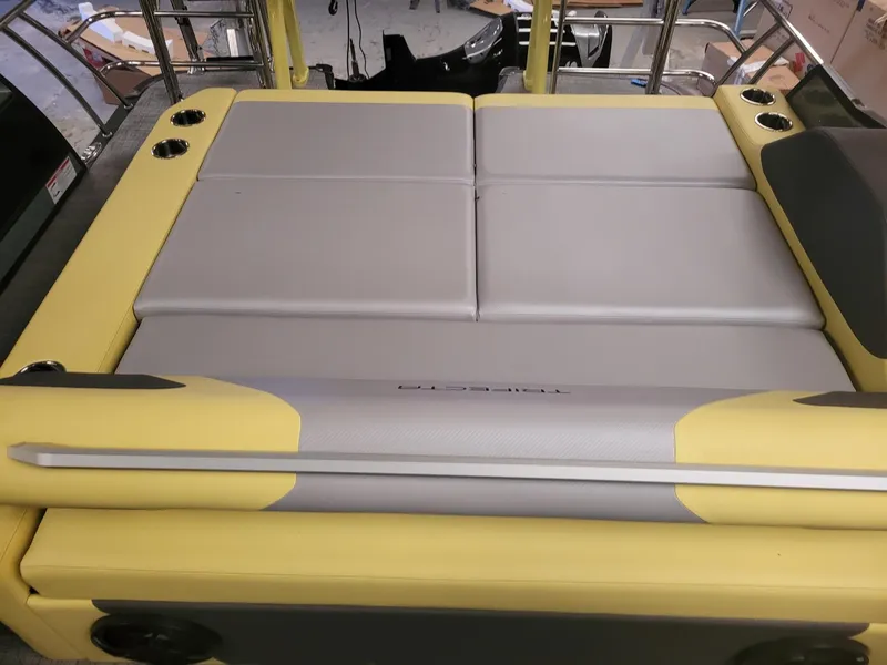 Slide: The Image of 2023 Trifecta 23 UL SS boat interior with yellow and gray seating. - 8