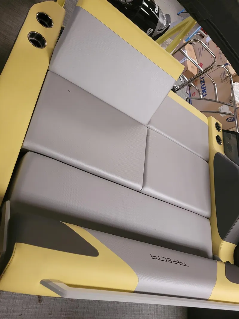 Slide: The Image of Yellow and gray seating on 2023 Trifecta 23 UL SS boat, showcasing modern design. - 9