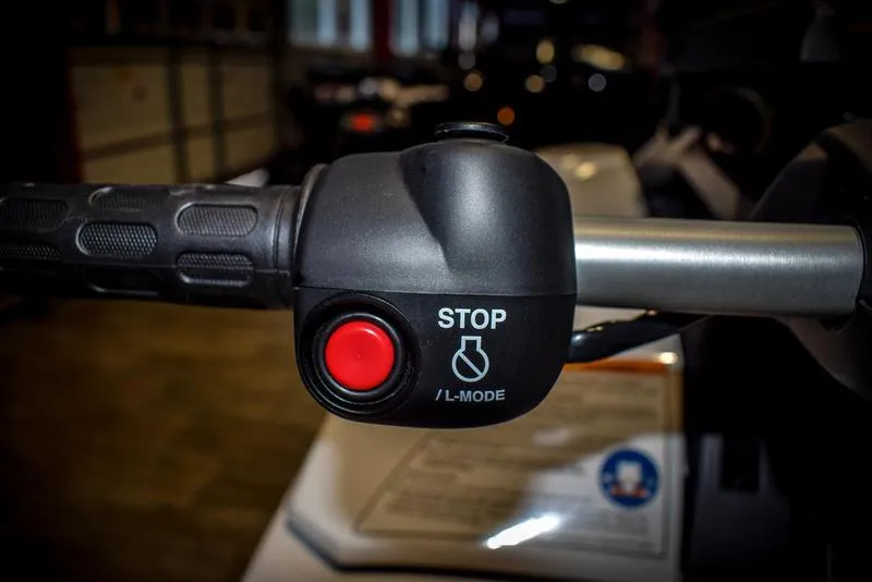 Slide: The Image of Close-up of 2022 Yamaha WaveRunner SuperJet handlebar with stop button. - 10