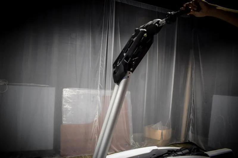 Slide: The Image of 2022 Yamaha WaveRunner SuperJet handlebar in a dimly lit room. - 12