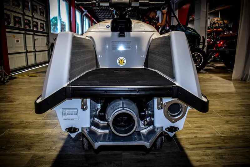 Slide: The Image of 2022 Yamaha WaveRunner SuperJet rear view in showroom. - 6