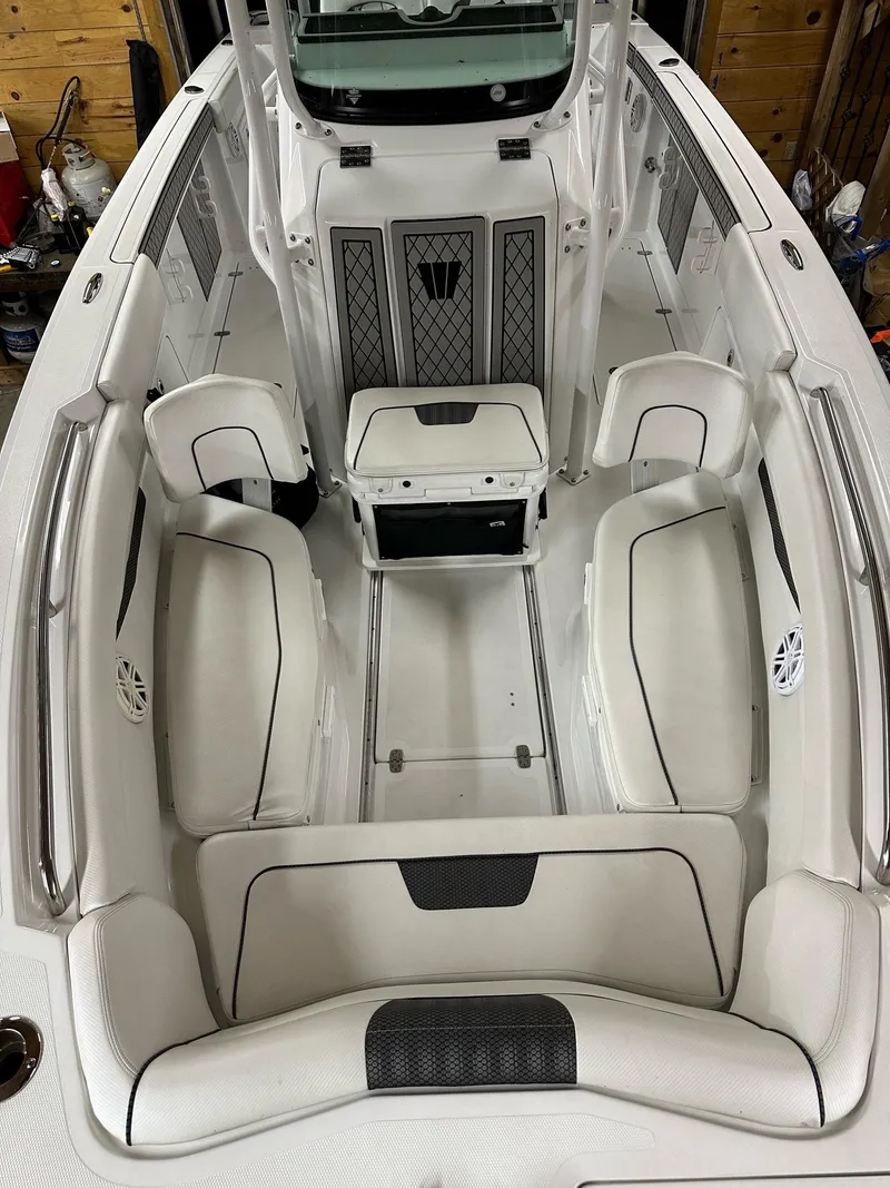 Slide: The Image of 2021 Wellcraft 262 Fisherman boat interior with spacious seating and modern design. - 44