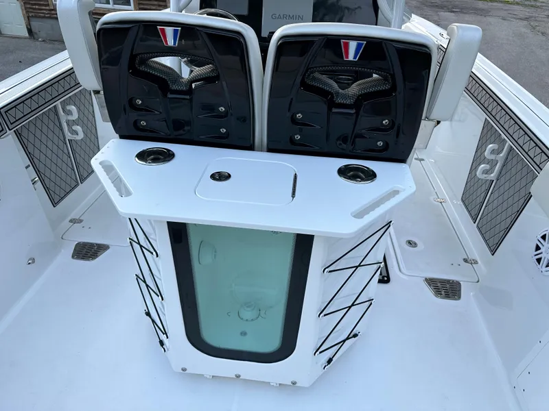 Slide: The Image of Wellcraft 262 Fisherman 2021 boat interior with seating and storage compartments. - 5