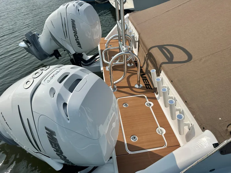 Slide: The Image of 2023 Twin Vee 340 GFX boat with dual Mercury outboard engines. - 15