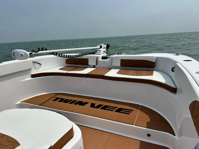 Slide: The Image of 2023 Twin Vee 340 GFX boat interior with seating and ocean view. - 18