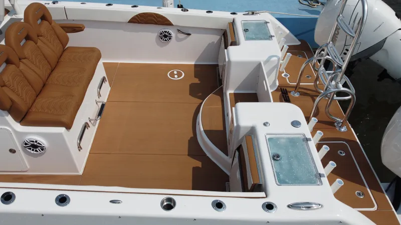 Slide: The Image of 2023 Twin Vee 340 GFX boat interior with seating and fishing amenities. - 29