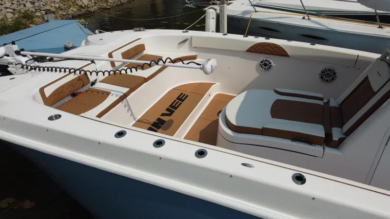 Slide: The Image of 2023 Twin Vee 340 GFX boat interior with seating and fishing equipment. - 33