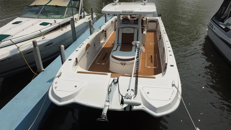 Slide: The Image of 2023 Twin Vee 340 GFX boat docked at marina, top view. - 37