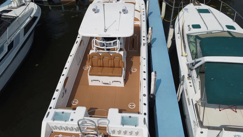 Slide: The Image of 2023 Twin Vee 340 GFX boat docked, aerial view. - 40