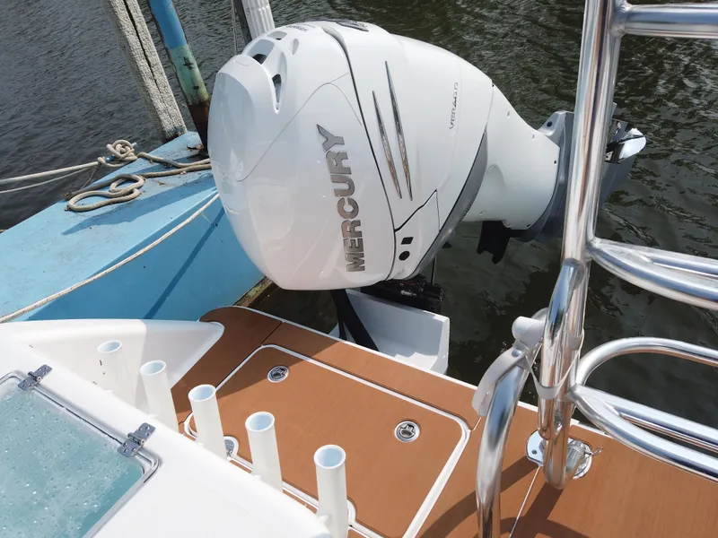 Slide: The Image of 2023 Twin Vee 340 GFX boat with Mercury outboard engine on water. - 45