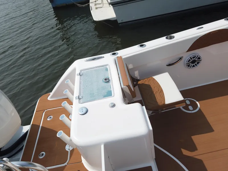 Slide: The Image of 2023 Twin Vee 340 GFX boat interior with fishing rod holders and seating. - 49