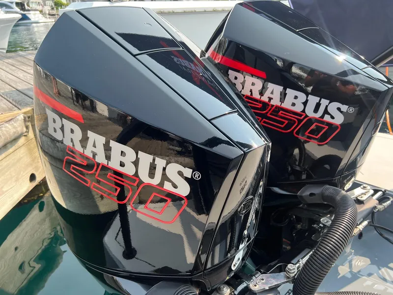Slide: The Image of Twin BRABUS 250 outboard engines on a 2022 Shadow 500 Cabin boat. - 12