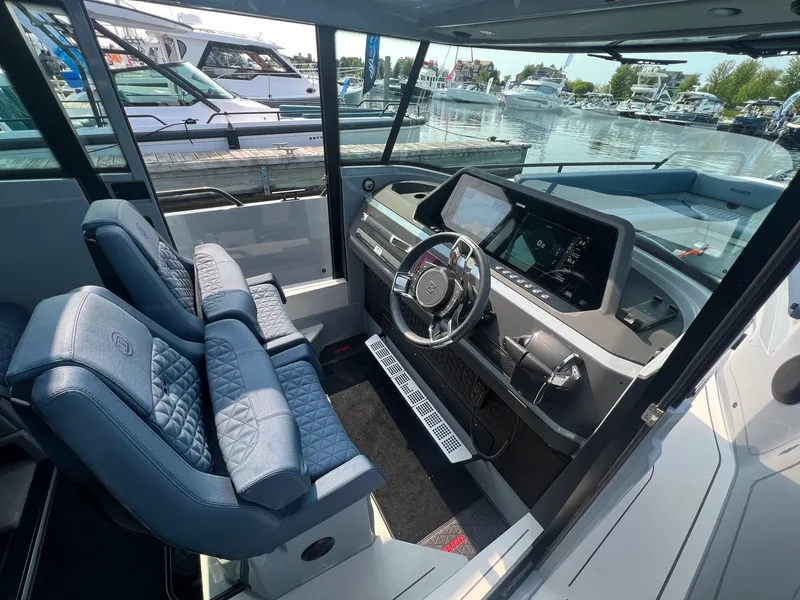 Slide: The Image of 2022 BRABUS Shadow 500 Cabin interior with modern dashboard and luxurious seating. - 13