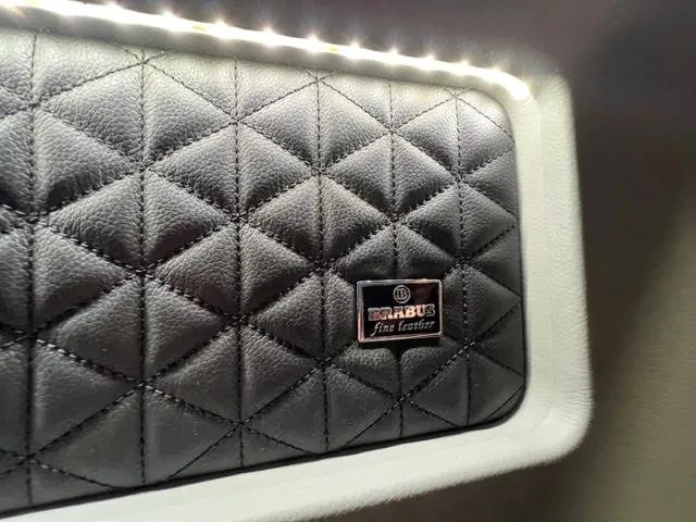 Slide: The Image of Luxurious black leather interior of 2022 BRABUS Shadow 500 Cabin with quilted design. - 30