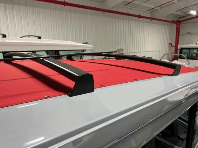 Slide: The Image of 2022 BRABUS Shadow 500 Cabin roof with red cover and black rails. - 31