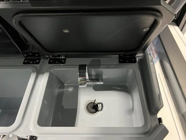 Slide: The Image of 2022 BRABUS Shadow 500 Cabin sink with closed lid and modern faucet. - 33