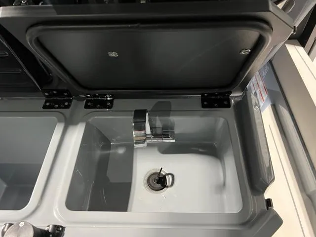 Slide: The Image of 2022 BRABUS Shadow 500 Cabin sink with modern faucet and closed lid. - 34