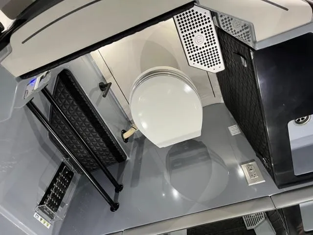 Slide: The Image of 2022 BRABUS Shadow 500 Cabin interior, featuring a modern, compact bathroom design. - 35