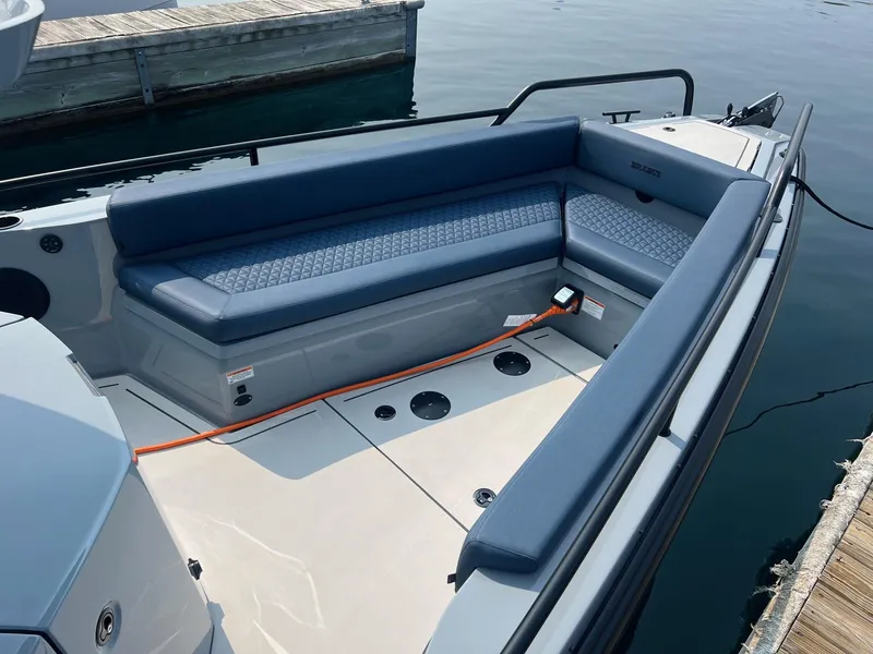 Slide: The Image of 2022 BRABUS Shadow 500 Cabin boat with sleek seating area at the dock. - 7