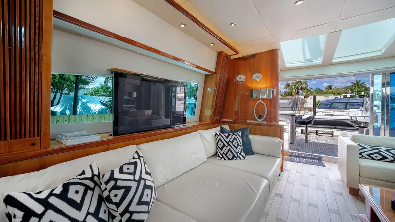 Slide: The Image of Luxurious interior of 2007 Sunseeker Predator 108 yacht with modern decor and waterfront view. - 18