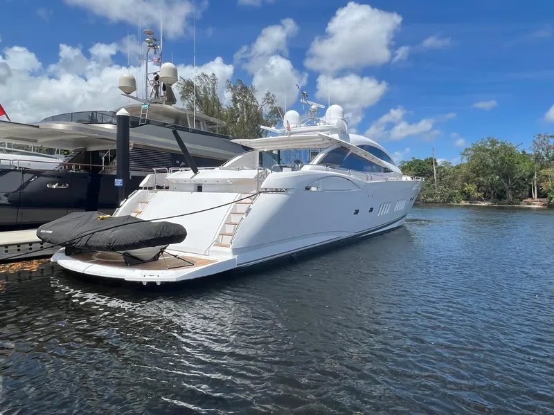 Slide: The Image of 2007 Sunseeker Predator 108 luxury yacht docked on a sunny day. - 2