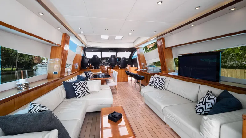 Slide: The Image of Luxurious interior of 2007 Sunseeker Predator 108 yacht with white leather seating and modern decor. - 20