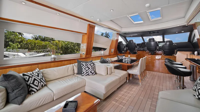 Slide: The Image of Luxurious interior of 2007 Sunseeker Predator 108 yacht with modern seating and helm station. - 22