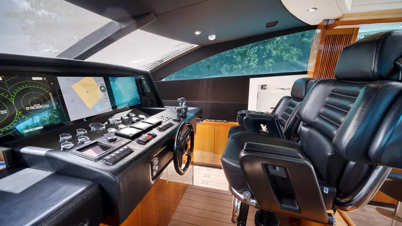 Slide: The Image of Interior helm of 2007 Sunseeker Predator 108 yacht with advanced navigation controls. - 29