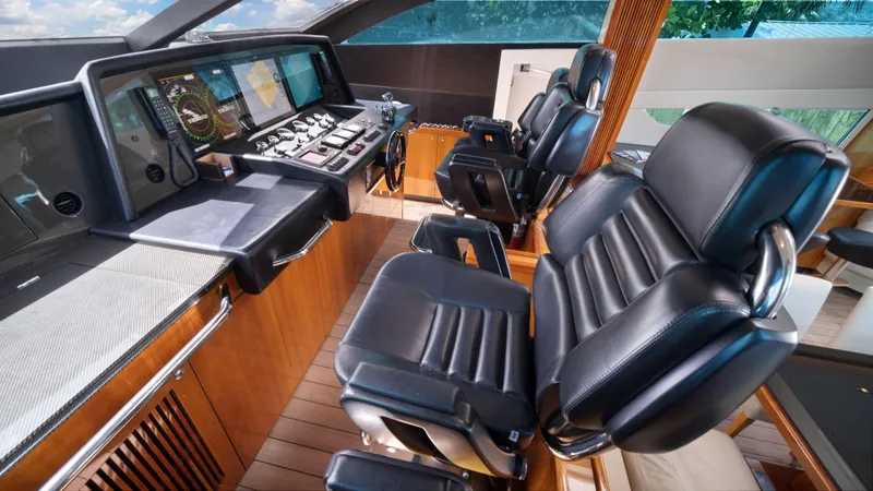 Slide: The Image of Interior helm of 2007 Sunseeker Predator 108 yacht with leather seats and advanced navigation. - 30