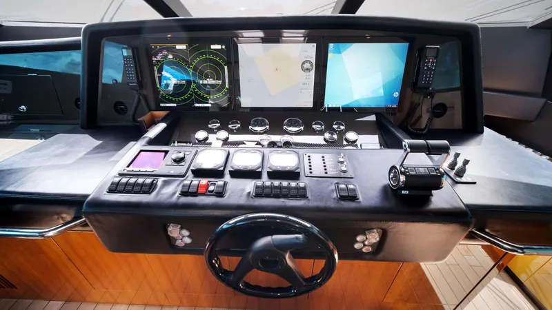 Slide: The Image of Control panel of a 2007 Sunseeker Predator 108 yacht with advanced navigation systems. - 31