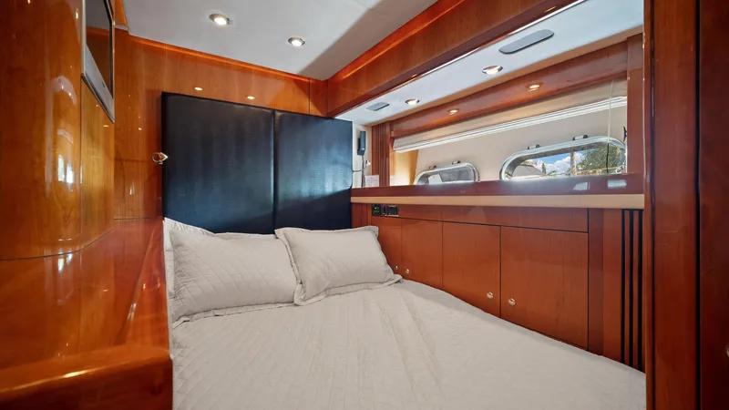 Slide: The Image of Luxurious bedroom interior of 2007 Sunseeker Predator 108 yacht with wooden finishes. - 41