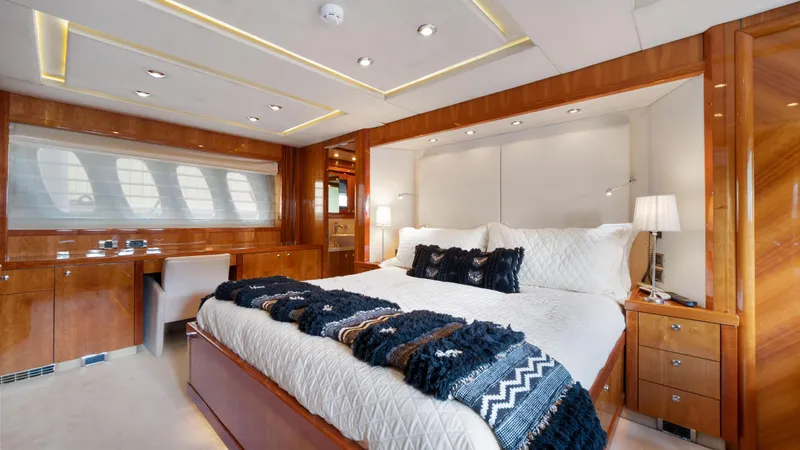 Slide: The Image of Luxurious master bedroom on 2007 Sunseeker Predator 108 yacht with elegant wood finishes. - 45