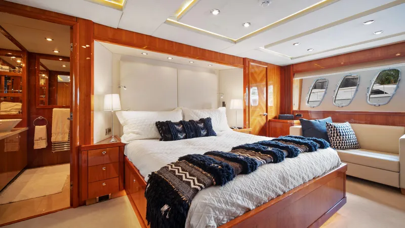 Slide: The Image of Luxurious bedroom interior of 2007 Sunseeker Predator 108 yacht with elegant wood finishes. - 46