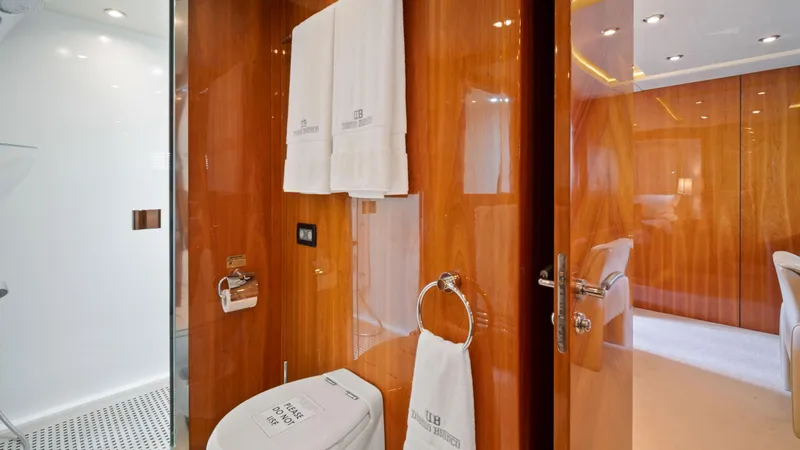Slide: The Image of Luxurious bathroom on a 2007 Sunseeker Predator 108 yacht with wooden finishes. - 49