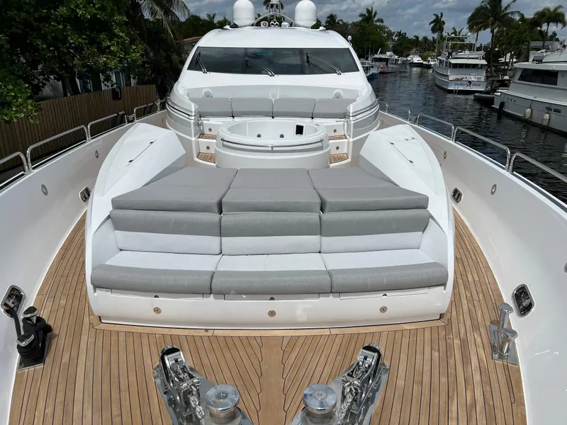 Slide: The Image of 2007 Sunseeker Predator 108 yacht with spacious deck and cushioned seating. - 6