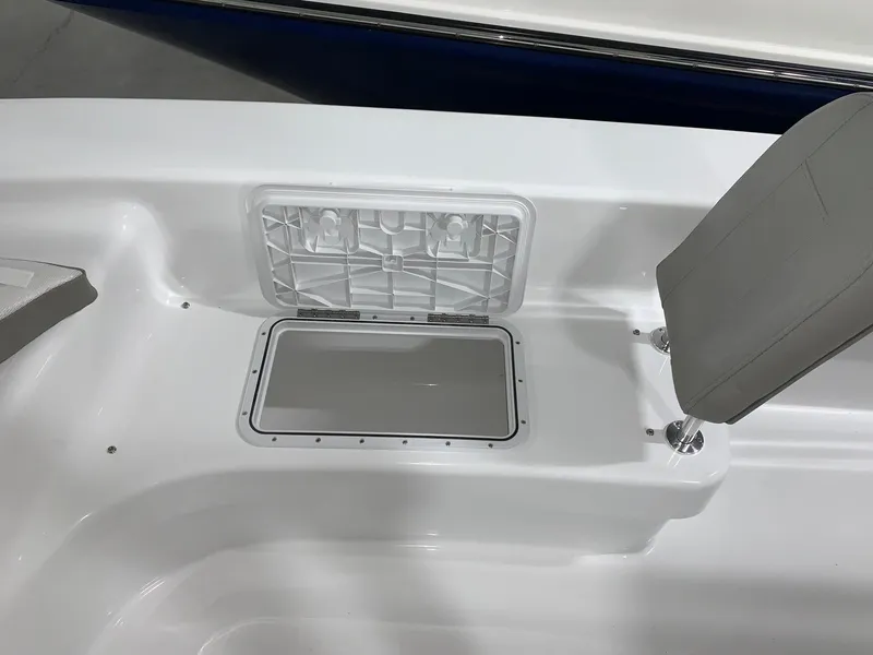 Slide: The Image of 2024 Savannah SS21 boat interior storage compartment and seating area. - 13